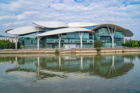 Tbilisi, Georgia - 01 August, 2021: House of Justice and the Civil Registry Agency near the Kura River in the center of Tbilisi. Modern buildingのeditorial素材
