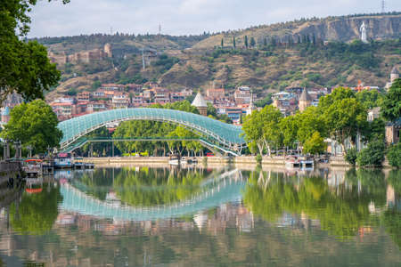 Tbilisi, Georgia - 01 August, 2021: The Bridge of Peace in Tbilisi. Travelの写真素材