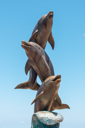 Batumi, Georgia - 30 August, 2022: Dolphin statue on the coast of Batumi. Travelのeditorial素材
