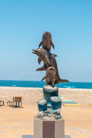Batumi, Georgia - 30 August, 2022: Dolphin statue on the coast of Batumi. Travelのeditorial素材