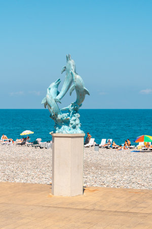 Batumi, Georgia - 30 August, 2022: Dolphin statue on the coast of Batumiのeditorial素材