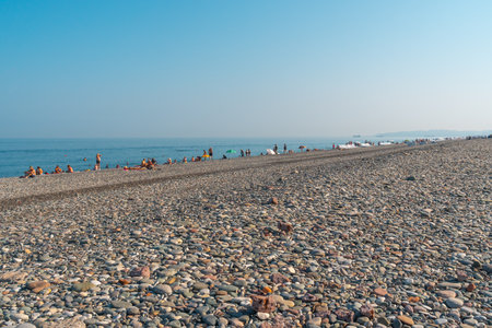 Batumi, Georgia - 30 August, 2022: People relax on the beach in Batumiのeditorial素材