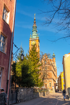 Gdansk, Poland - 12 March, 2022: Old historical centre and city Hall spire clock tower, Gdansk. Travelのeditorial素材
