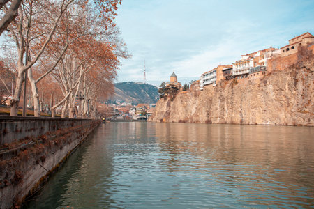 Metekhi church and Houses on the edge of a cliff above the river Kura. Travelの写真素材