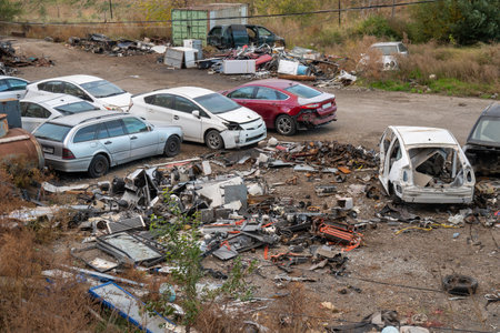 Damaged cars on the junkyard, discarded old cars. Outdoorの写真素材