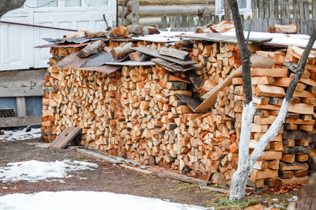 Preparation of firewood for the winter. firewood background, Stacks of firewoodの写真素材