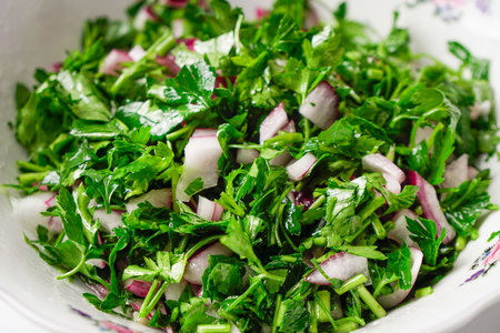 Chopped Parsley Salad with Onions in Ceramic Bowl. Foodの写真素材