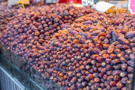 Dates on a shopping counter. Popular food in Eastern countries. Healthy foodの写真素材