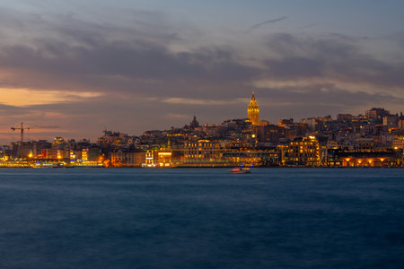 Galata Tower and Golden Horn bay at night. Istanbul, Turkey. Travelの写真素材