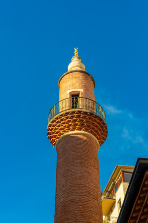 The minaret of a Muslim mosque built of red brick. Religionの写真素材