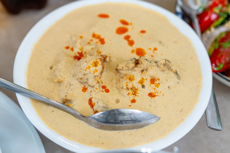 Cold Georgian dish of boiled salmon With walnut sauce. Foodの写真素材