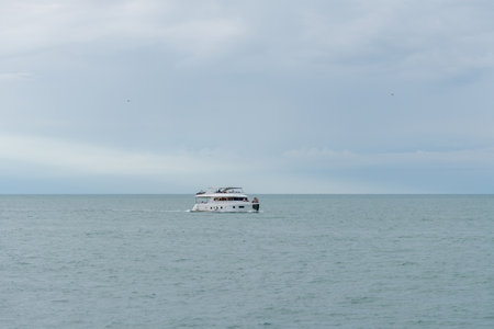 A small boat for tourists in the coastal waters of Batumi. Black seaの写真素材