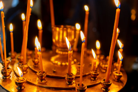 Candles. Church candles burnt On a special stand. Religionの写真素材