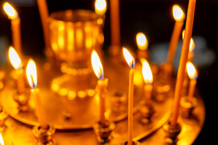 Candles. Church candles burnt On a special stand. Religionの写真素材