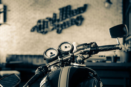 Cafe racer triumph black white sepia coffee の写真素材