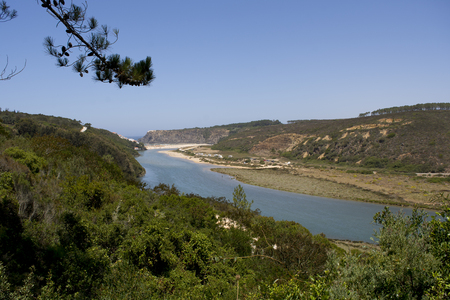 landscape of a beautiful beach in the algarve portugal の写真素材