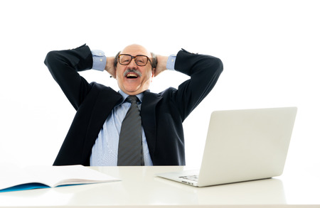 Corporate portrait of happy senior business man confident and satisfied working on computer laptop...