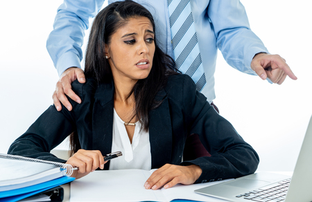 Uncomfortable scared woman being harass by her boss at office in Sexual harassment at work place, women rights, sexual abuse concept isolated in white background.の写真素材