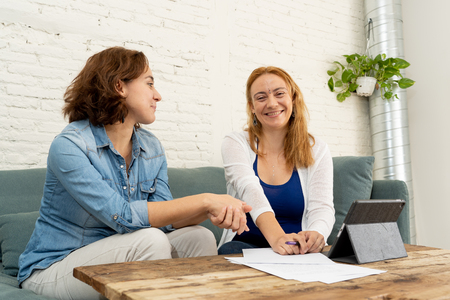 Active creative young businesswomen working together as freelancer in new project on laptop at cool urban home in start up small business Entrepreneur New ideas Creativity and Innovation concept.の写真素材