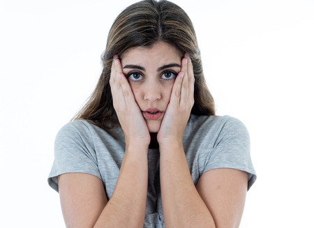 Portrait of young sad woman, scared and concerned, looking worried and disgusted. Feeling sorrow and...
