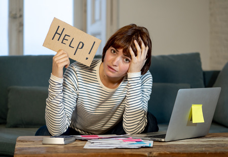 Portrait of worried young woman feeling stressed and desperate asking for help in paying bills,...