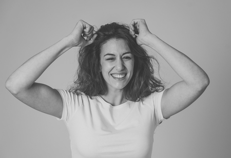 Portrait of beautiful shocked woman winning or having great success with surprised and happy face feeling so happy. In human Expressions Positive Emotions and success celebration. copy space.の写真素材