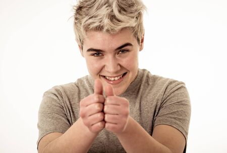 Portrait of attractive young model with happy face, beautiful smile and blue eyes. Handsome hipster...
