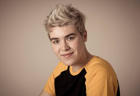 Portrait of young attractive stylish fashion teenager confident and happy with his gender identity....