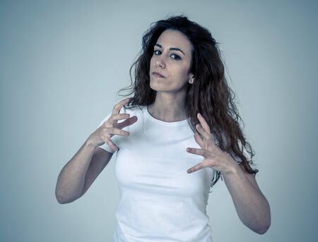 Close up portrait of attractive frustrated caucasian woman with angry and stressed face. Looking mad...