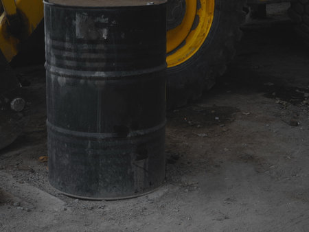black barrel with oil for construction purposes, construction industry site