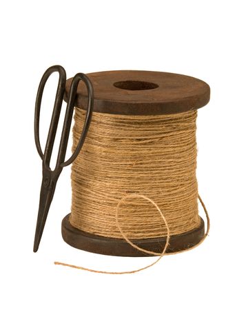 Wooden spool of garden twine and scissors