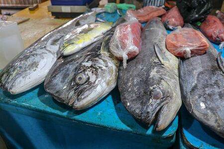 Selling fresh seafood fish on the tourist attraction local market in Jimbaran, Bali Island. Fresh...