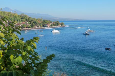 Jemeluk Bay, Amed. Amed is fast becoming a popular tourist destination in Bali, Indonesia. Set in the North-East of Bali, it is a home to excellent snorkeling, scuba diving, freediving and yoga.の写真素材