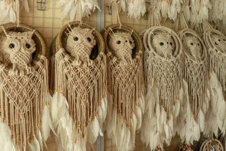 Dream catcher with feathers threads and beads rope hanging. Dreamcatcher handmade