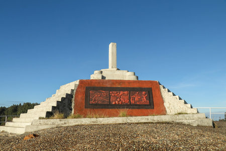 the monument at the top of the lake kelimutu view. Three multicolored cratered acid lakes that periodically change their color, Flores, Indonesiaの写真素材