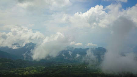 Aerial view of hills in Ende Flores with clouds.