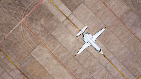 Aerial view of private business jet is waiting at the airportの写真素材