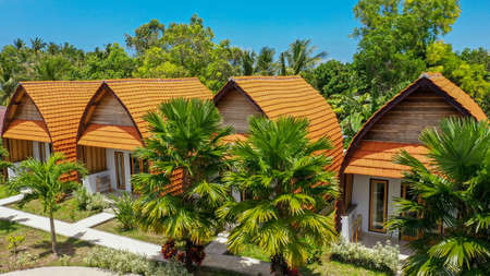 Aerial view of a resort and bungalows in tourist destination Ubud, Bali, Indonesiaの写真素材