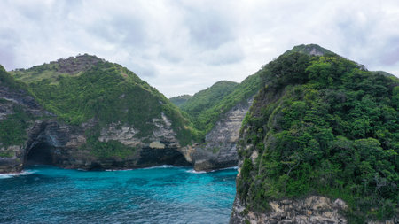 Rocky islet in the Indian oceanOcean. Aerial footage of isolated island, washed with sea waters. High quality 4k footageの写真素材