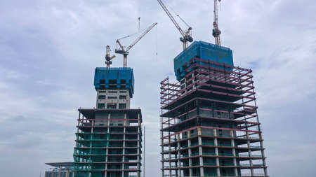 Aerial view of construction crane at building site. Industrial conceptの写真素材