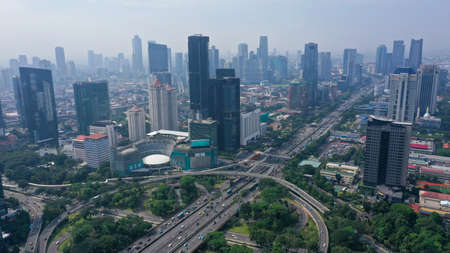 Aerial view of the city traffics at semanggi Roundabout, Jakarta, Indonesia. Aerial view on highways...