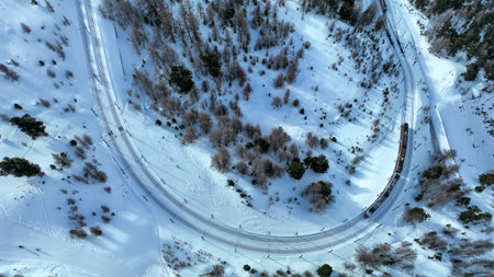 Aerial top down train running to the Gornergrat station in the famous touristic place
