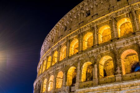 The lighting of the pole helped a lot in the composition of this photograph. The Roman Colosseum was photographed on its side.の写真素材