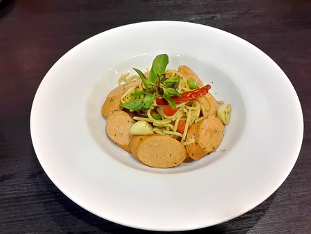 Spicy Stir Fried Spaghetti with Pork Sausageの写真素材
