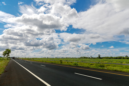 asphalt road and sky in thailandの写真素材