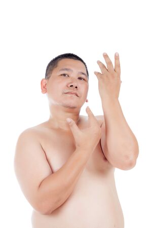 Portrait of the chubby bare Asian man poses like as a beautiful woman., isolated on white background.の写真素材