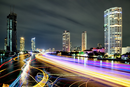 Light effects over time after sunset on Chao Phraya river in Bangkok City, Thailand.の写真素材