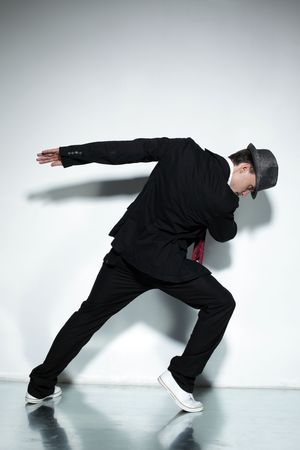 modern style dancer posing on studio backgroundの写真素材