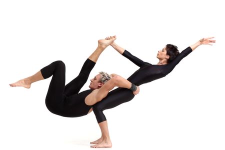 two young modern acrobats posing on whiteの写真素材