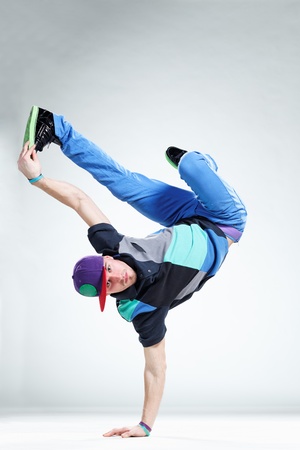 modern style dancer posing on studio backgroundの写真素材